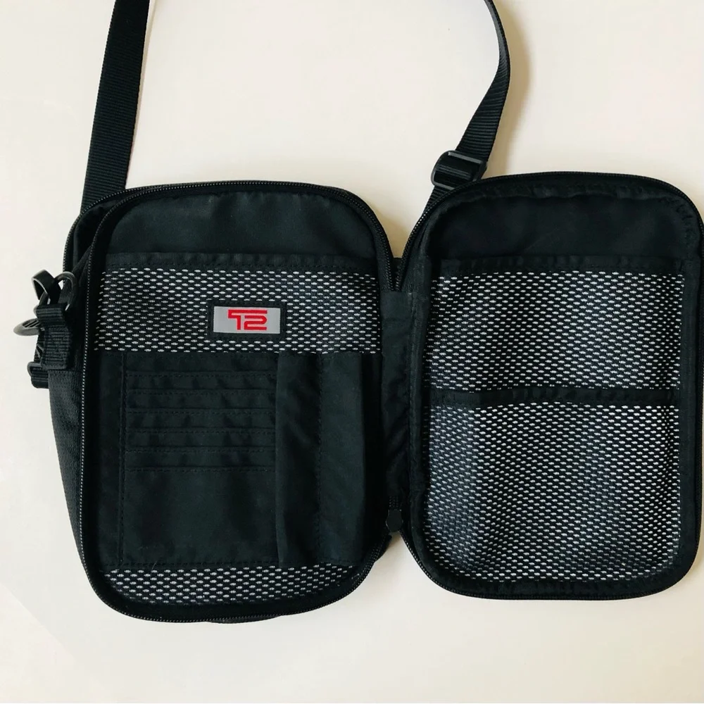 TUMI Leather & Canvas Unisex Shoulder Bag, Gently Used.